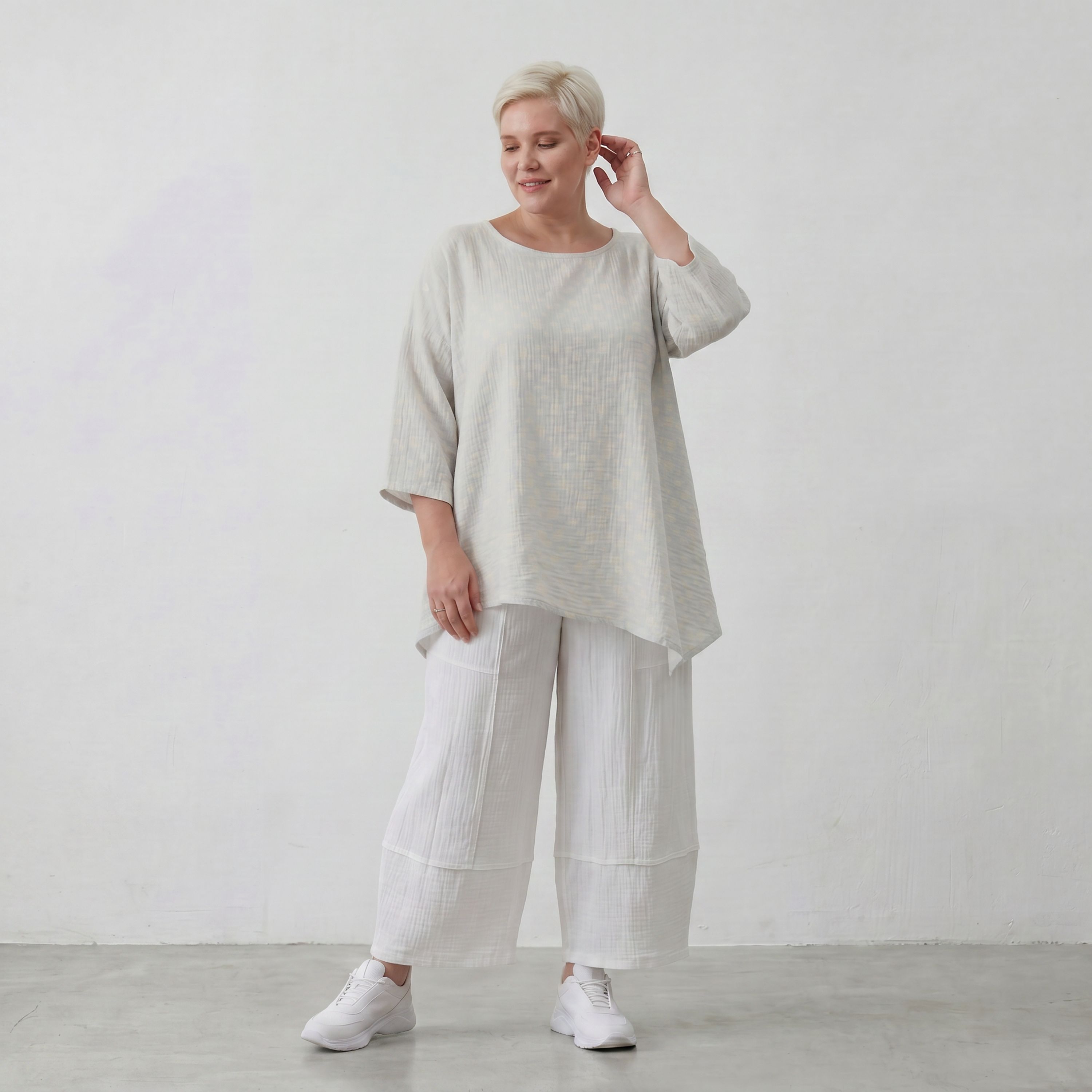 Luftiges Baumwoll-Shirt in A-Linie mit zipfeligem Saum