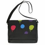 Winter shoulder bag in a straight shape made of fine quality leather, baggy in black with polka dots