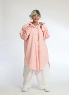 Summer blouse in a rounded shape made of soft seersucker quality, Tessa in orange