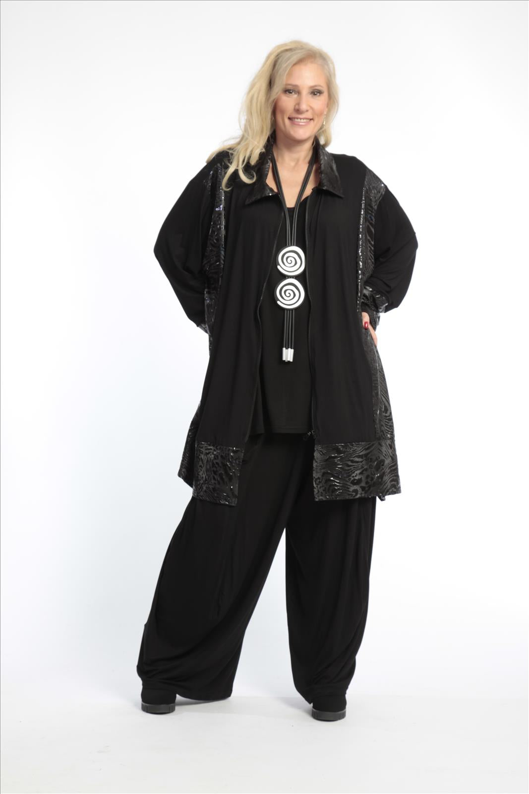 Winter jacket in A-shape made of jersey quality, glitter leo in black