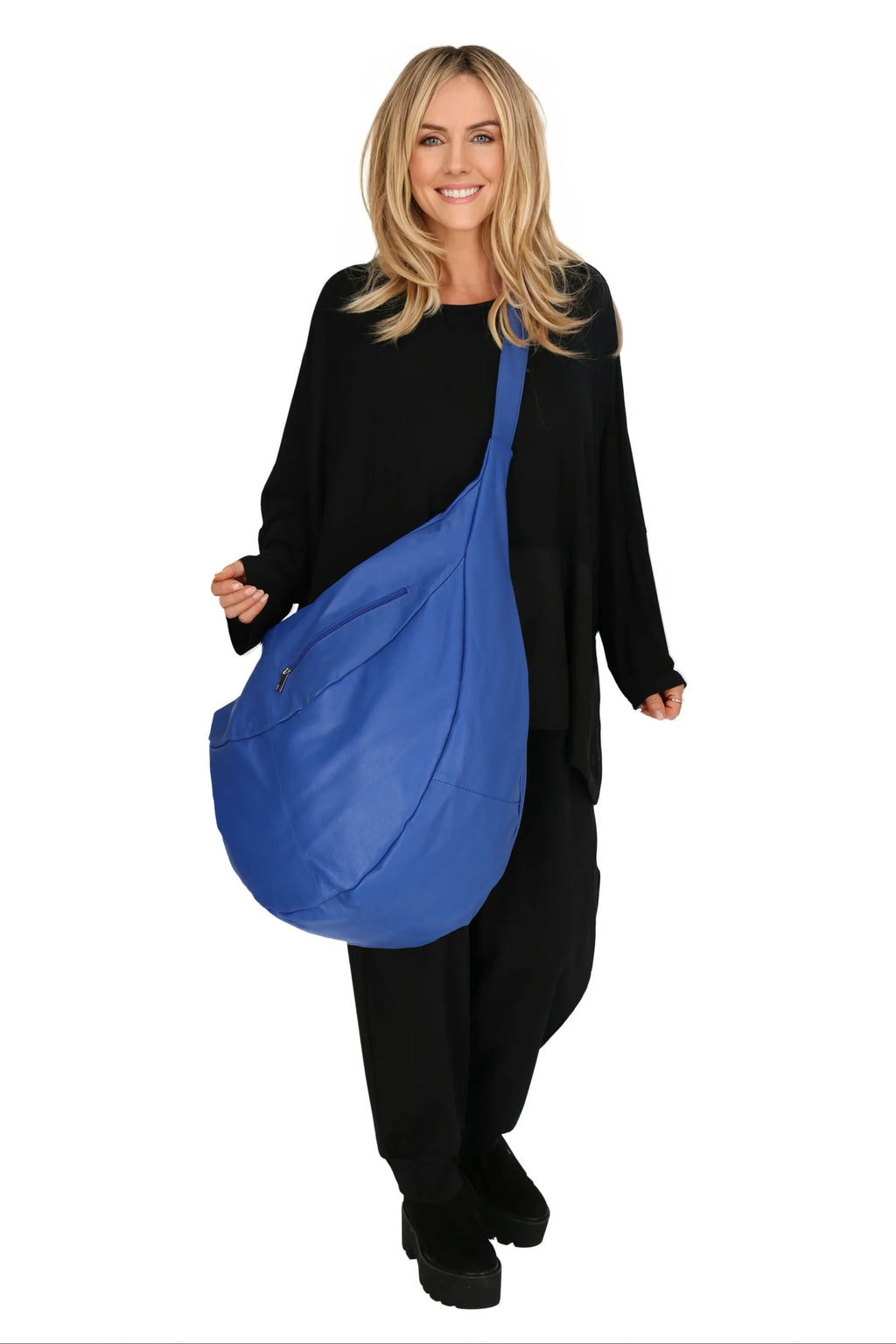 Everyday bag in a balloon shape, made of smooth, high-quality leather, baggy style in royal blue