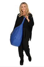 Everyday bag in a balloon shape, made of smooth, high-quality leather, baggy style in royal blue