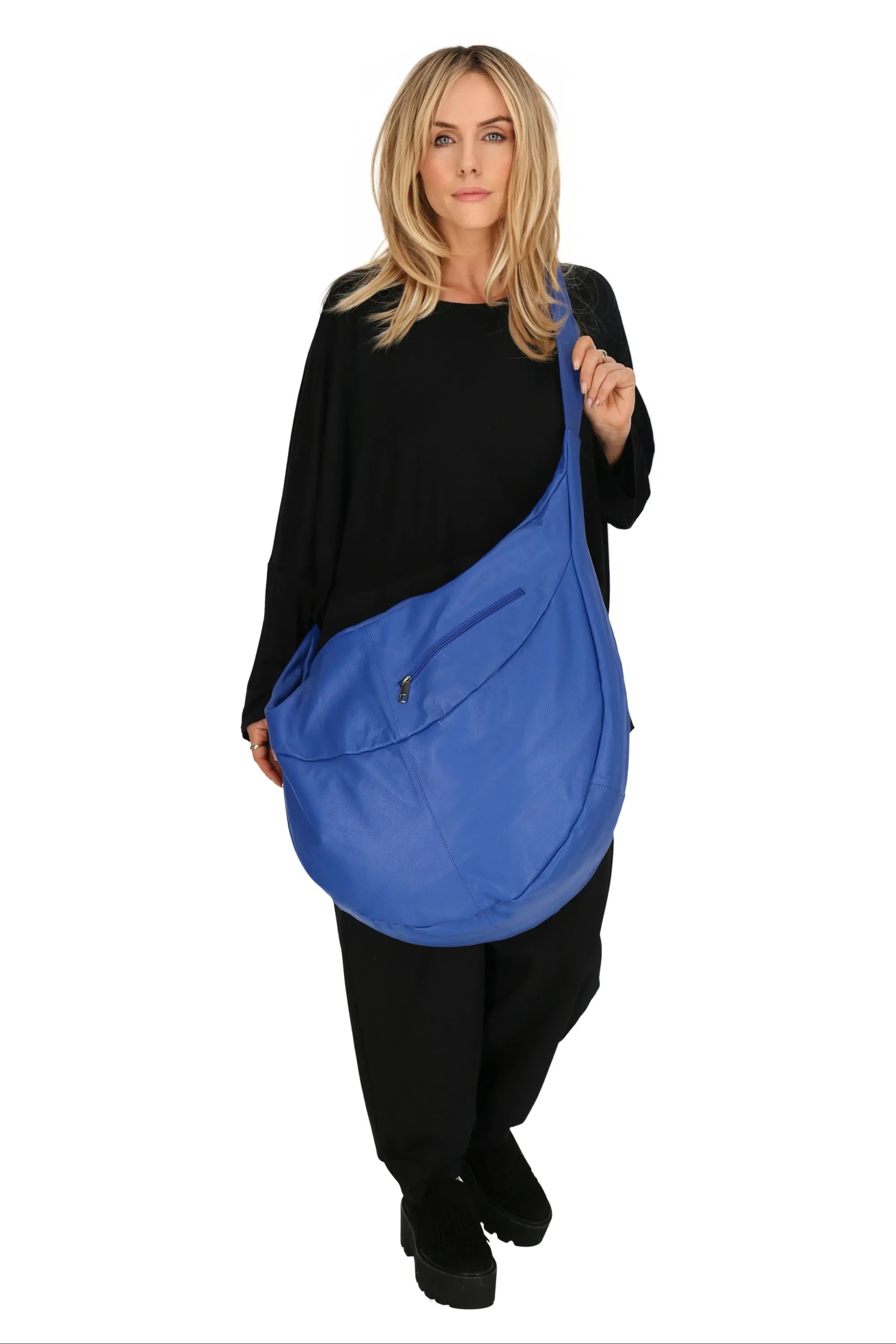 Everyday bag in a balloon shape, made of smooth, high-quality leather, baggy style in royal blue