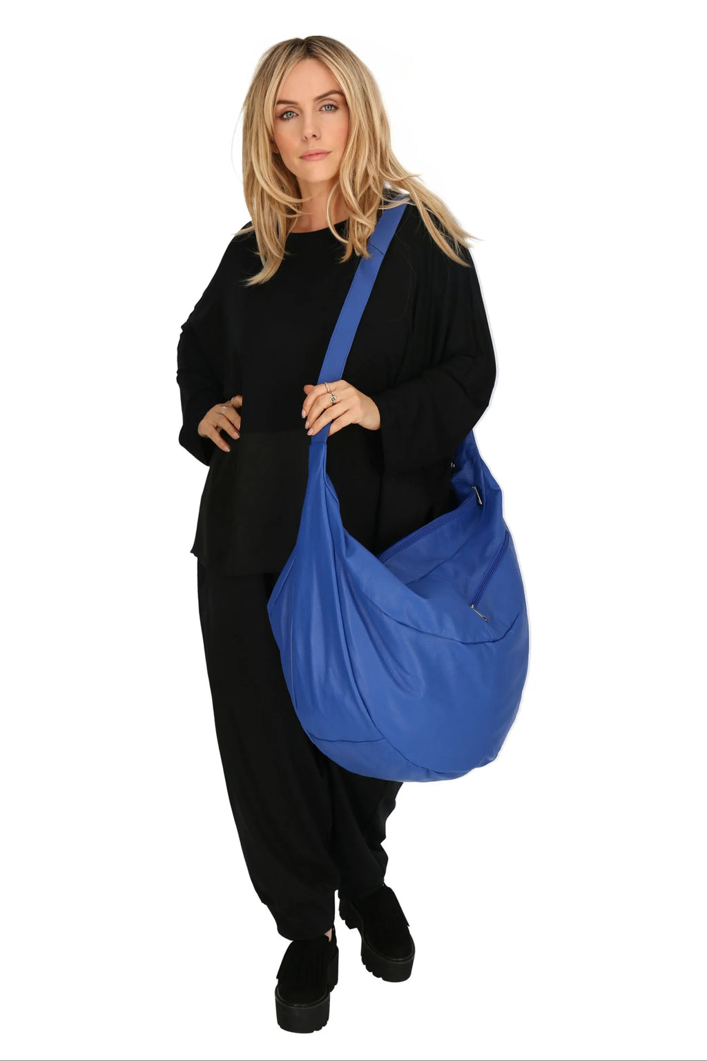 Everyday bag in a balloon shape, made of smooth, high-quality leather, baggy style in royal blue