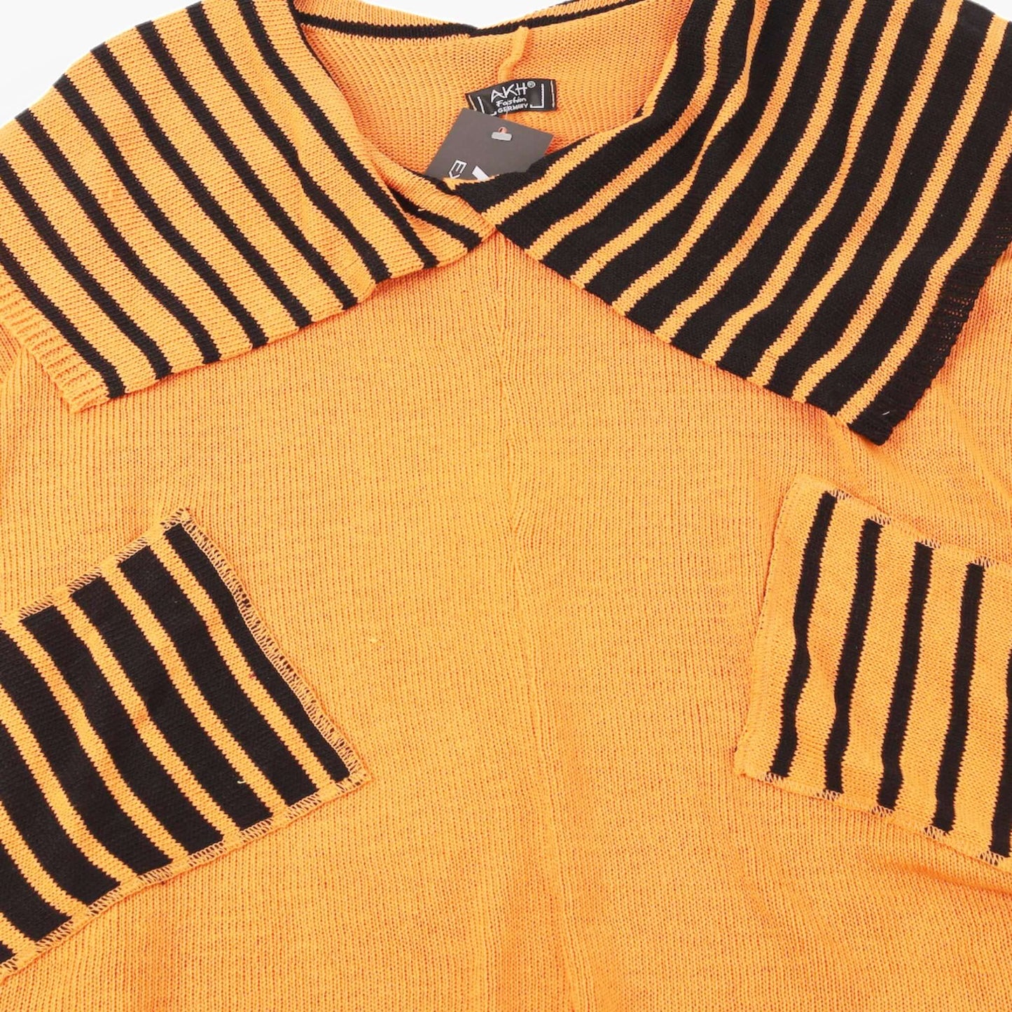 Transitional sweater in a boxy shape made of fine knit quality, Nitto in orange-black