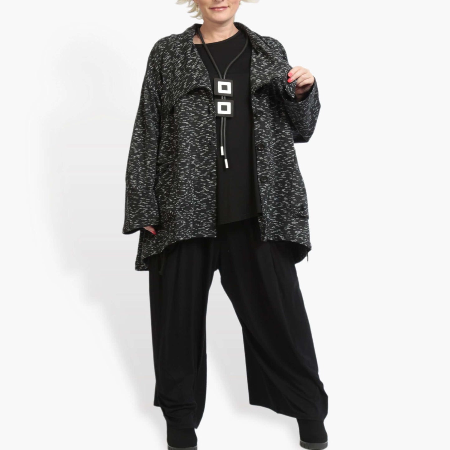 Winter jacket in A-shape made of fine jacquard quality, Mela in black and white