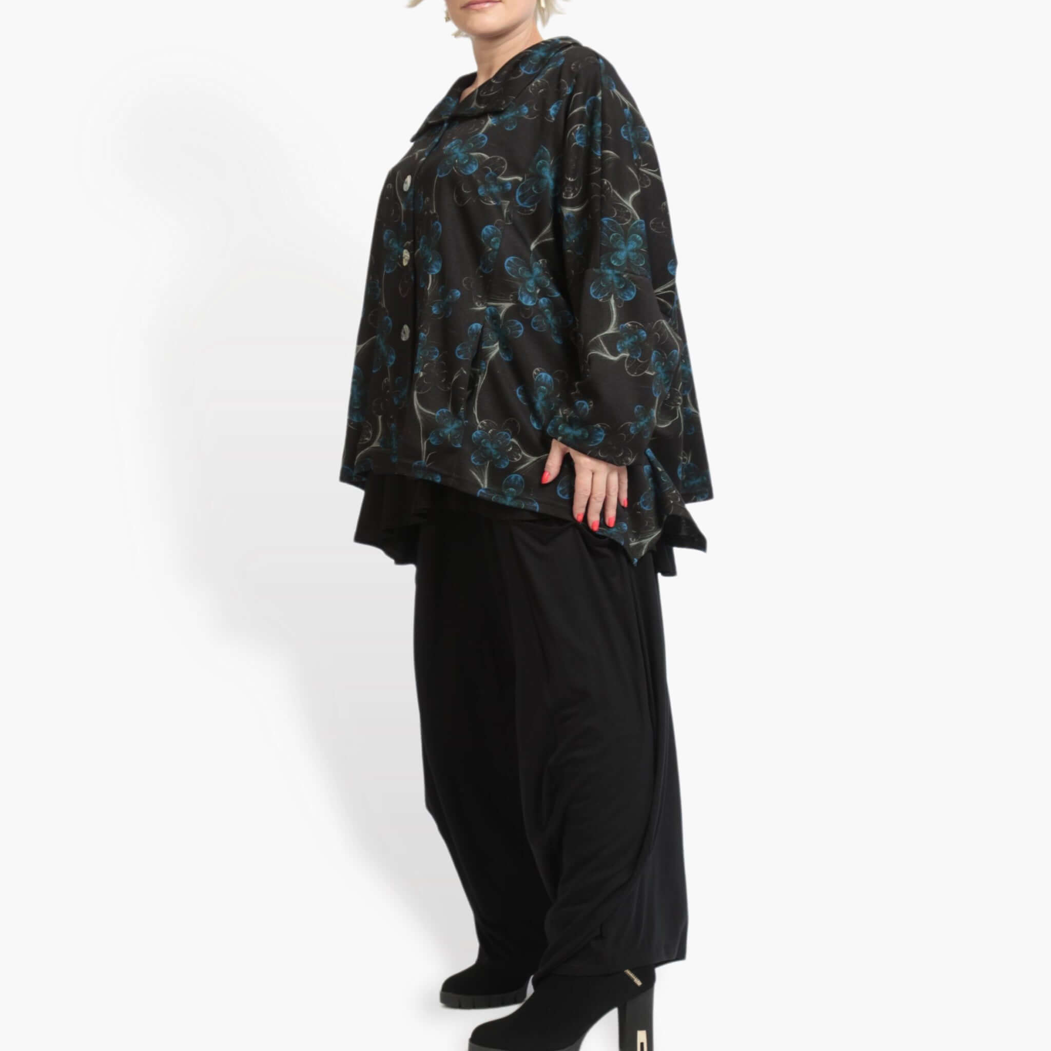 Winter jacket in A-shape made of fine Romanit jersey quality, petrol in black-petrol