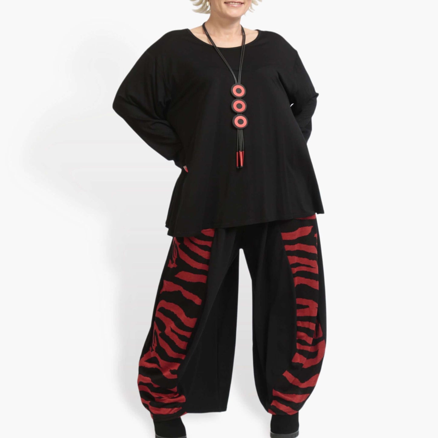 Winter trousers in balloon shape made of soft Romanit jersey quality, Lina in black and red