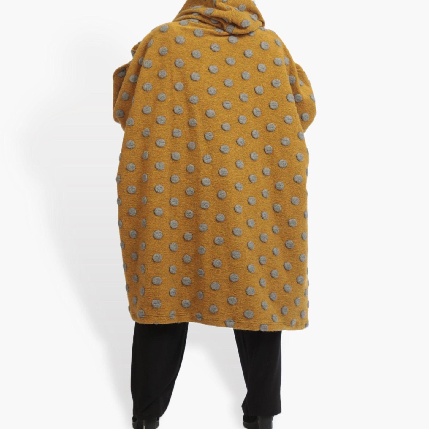 Winter coat in a straight shape made of high quality wool, large wool in mustard